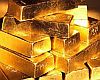 Zlato je navzdory sílícímu dolaru na rekordu, zdolalo 1400 dolarů