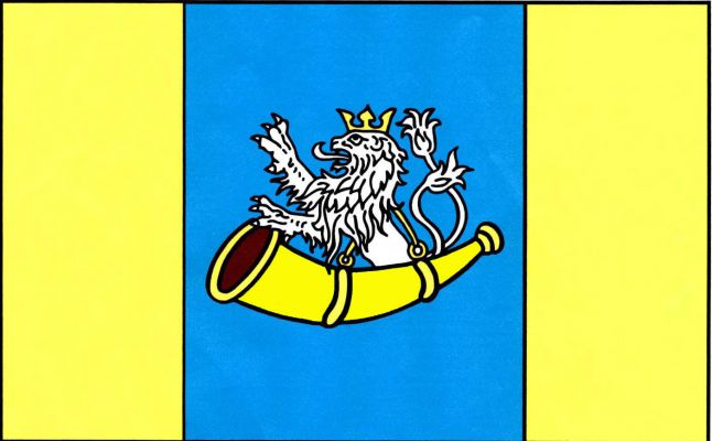 List tvoří tři svislé pruhy, žlutý, modrý a žlutý, v poměru 1 : 2 : 1. V modrém pruhu ze žluté trubky se závěsem vyrůstá bílý dvouocasý korunovaný lev. Poměr šířky k délce listu je 2 : 3.