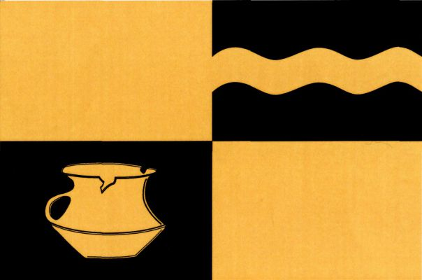Žluto - černě čtvrcený list, v dolním žerďovém poli žlutý únětický koflík, v horním vlajícím poli žlutý vlnitý pruh se třemi vrcholy a dvěma prohlubněmi, široký osminu šířky listu. Poměr šířky k délce listu je 2 : 3.