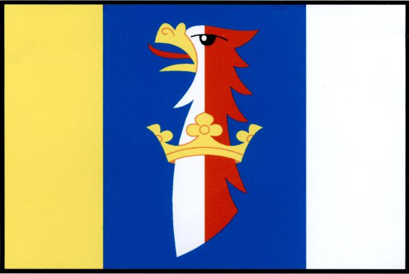 List tvoří tři svislé pruhy, žlutý, modrý a bílý, v poměru 1 : 2 : 1. V modrém pruhu bílo - červeně polcená orlí hlava se žlutým zobákem a s krkem provlečeným žlutou korunou. Poměr šířky k délce listu je 2 : 3.