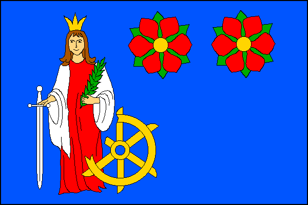 Modrý list, v žerďové polovině korunovaná postava sv. Kateřiny Alexandrijské v červeném šatě s bílým pláštěm a s bílým mečem hrotem k dolnímu okraji v pravé a zelenou palmovou ratolestí v levé ruce a žlutým zlámaným nožovým kolem u levé nohy. Ve vlající p