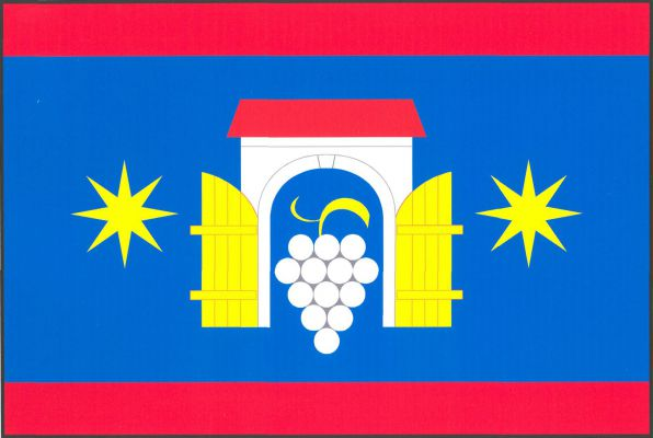 List tvoří tři vodorovné pruhy, červený, modrý a červený, v poměru 1 : 6 : 1. V modrém pruhu volná prázdná bílá brána s červenou valbovou střechou a žlutými otevřenými vraty, provázena dvěma žlutými osmicípými hvězdami. V bráně bílý hrozen se žlutým stonk