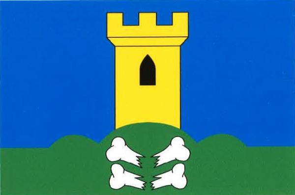 List tvoří dva vodorovné pruhy, modrý a zelený, v poměru 3 : 1. Uprostřed horního okraje zeleného pruhu vyniká zelené trojvrší, na něm žlutá věž s cimbuřím a černým gotickým oknem. Pod ní dvě bílé kosti pod sebou, zlomené k dolnímu okraji listu. Poměr šíř