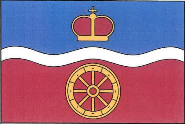 List tvoří tři vodorovné pruhy, modrý, vlnitý bílý se třemi vrcholy a dvěma prohlubněmi a zvlněný červený, v poměru 4 : 1 : 5. V modrém pruhu knížecí čepice. V červeném pruhu žluté vozové kolo. Poměr šířky k délce listu je 2 : 3.