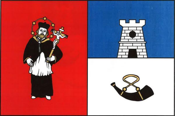 List tvoří dva svislé pruhy, červený a modro-bíle dělený. V červeném pruhu sv. Jan Nepomucký se svatozáří s pěti šesticípými žlutými hvězdami, v černobílém oděvu a s krucifixem v levé ruce. Z bílého pole do modrého pole vyniká bílá kvádrovaná věž s cimbuř