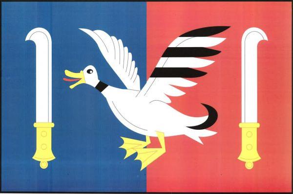 List tvoří dva svislé pruhy, modrý a červený. Uprostřed vzlétající bílý kačer s pětkrát černo-bíle děleným levým křídlem a černým páskem na krku, se žlutou zbrojí a červeným jazykem, provázený dvěma odvrácenými bílými vinařskými noži se žlutými rukojeťmi 